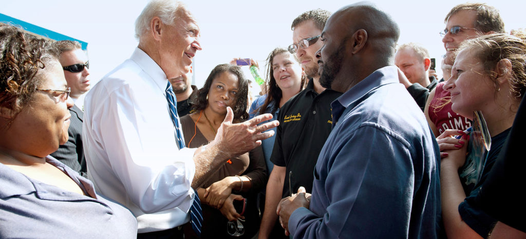 Joe talks to workers.